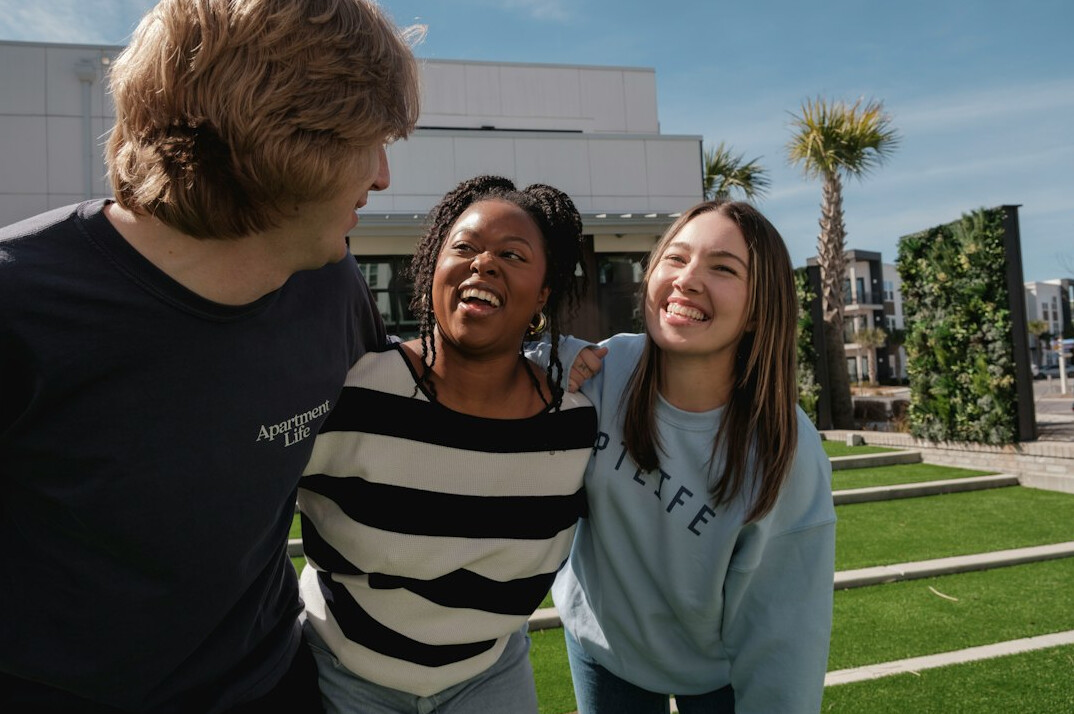 diverse group talking outdoors