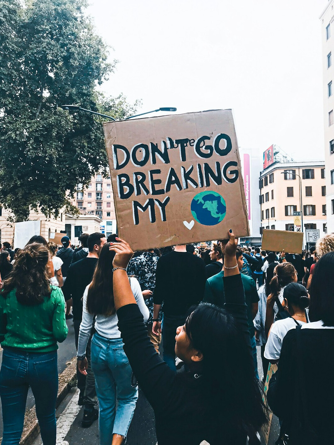 climate protest march with signs