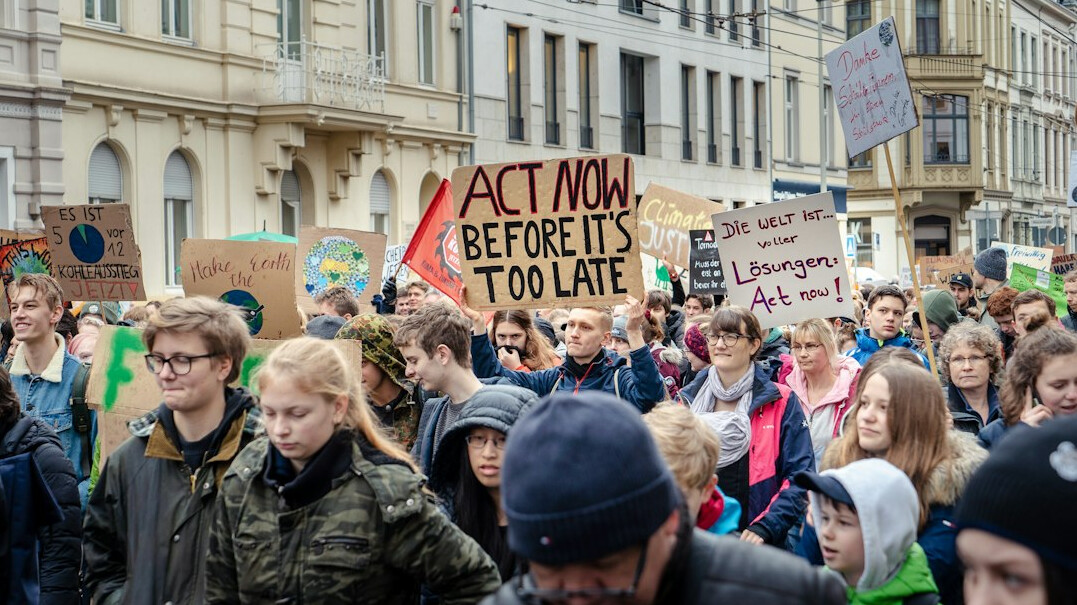 climate protest march with signs
